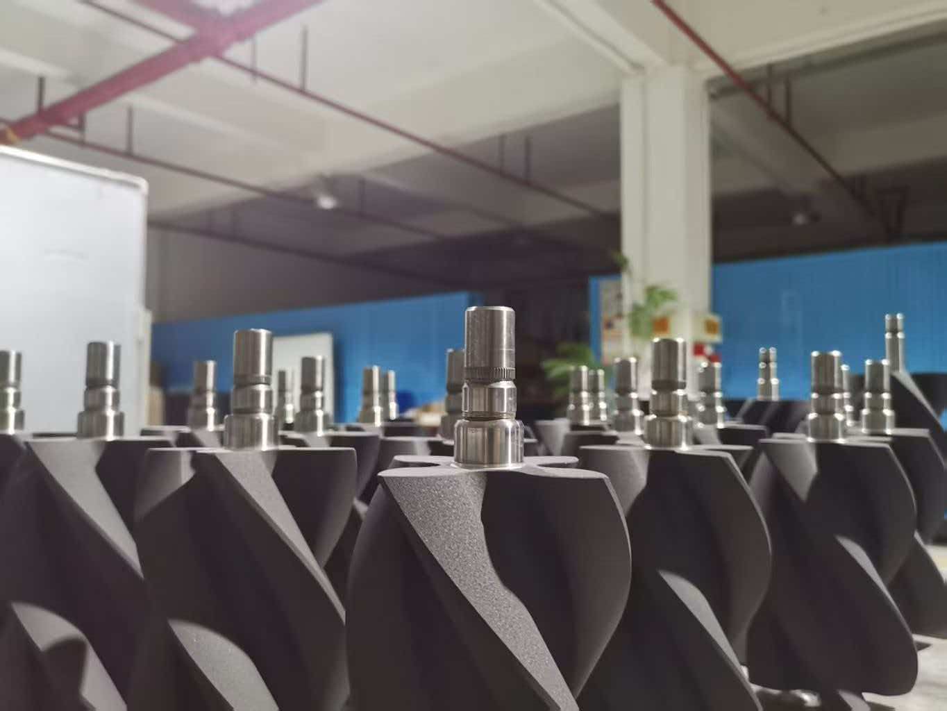 Supercharger rotor components on display